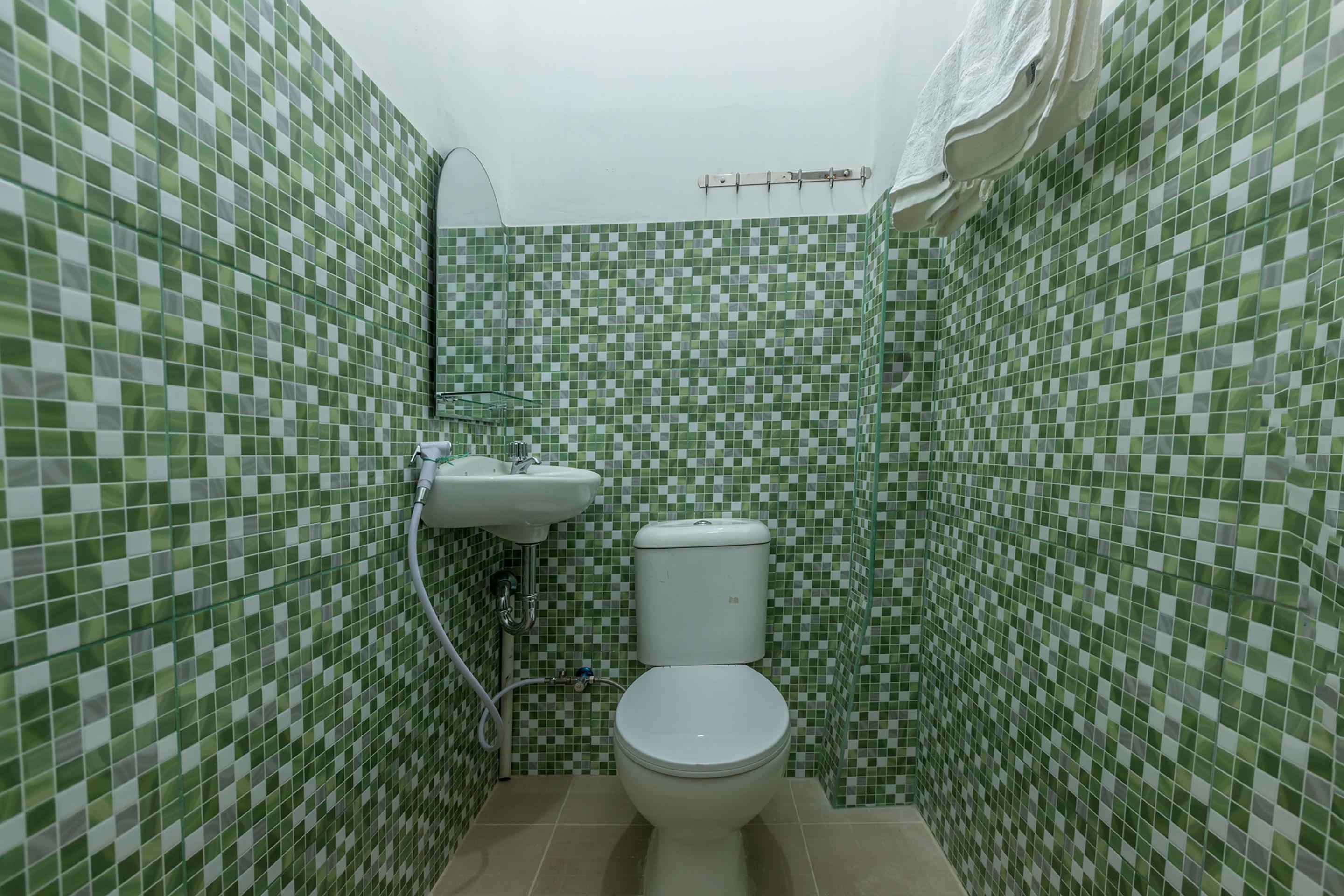 Super Oyo 1487 Residence Khoe Jakarta Buitenkant foto