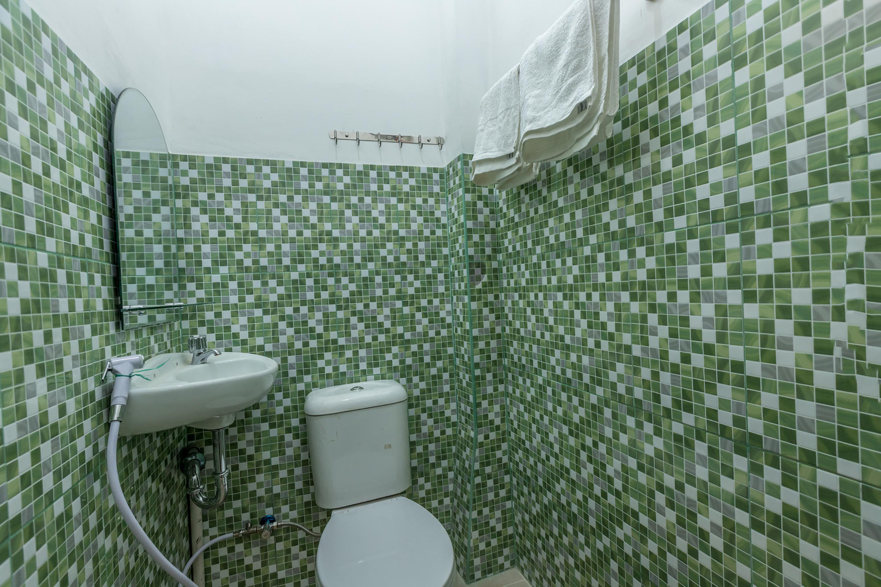 Super Oyo 1487 Residence Khoe Jakarta Buitenkant foto